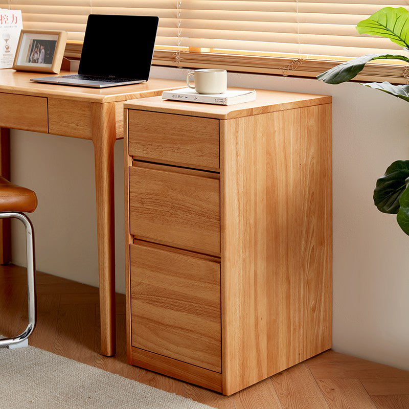 Jerry rubberwood three-drawer bedside table in natural finish – view 3