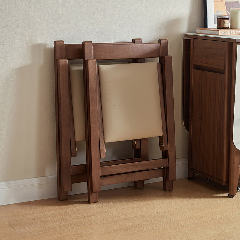Kurt folding timber dining chair in walnut colour – view 2