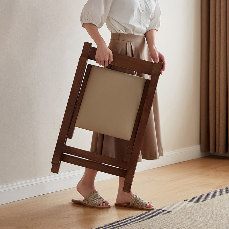 Kurt folding timber dining chair in walnut colour – view 4
