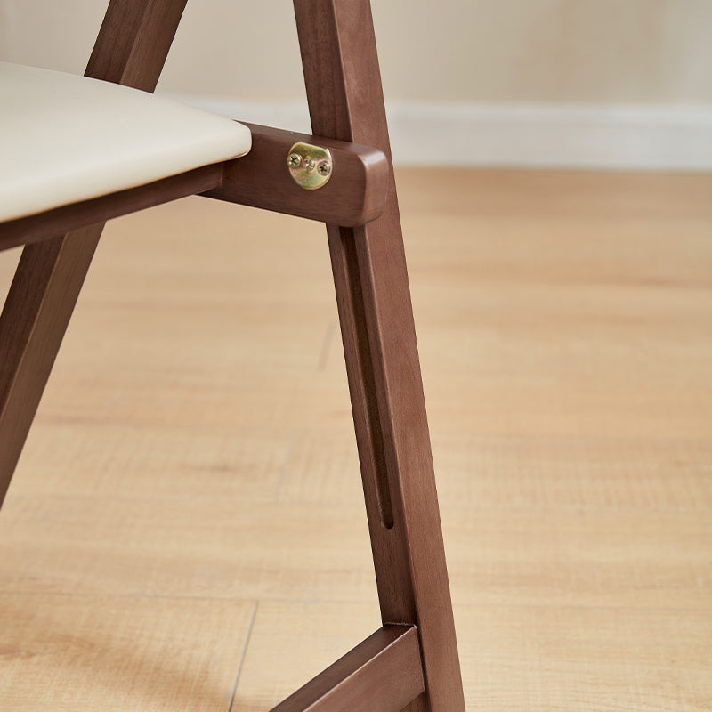 Kurt folding timber dining chair in walnut colour – view 5
