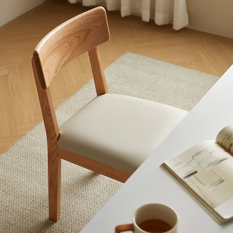 Kya armless solid oak dining chair in walnut colour – view 2