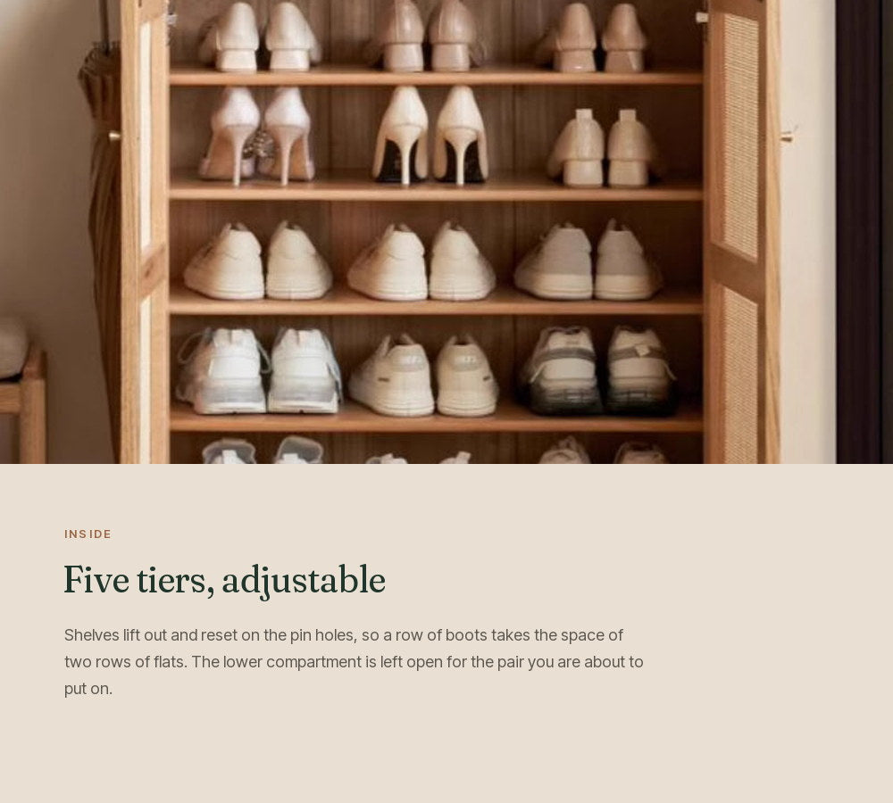 The cabinet open, five adjustable tiers filled with shoes
