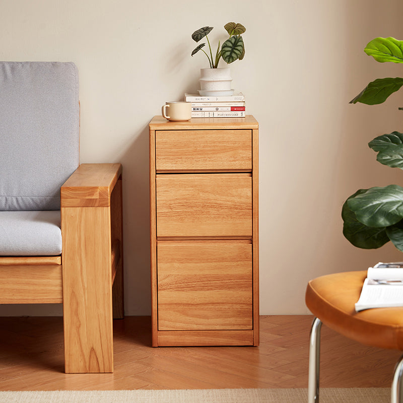 Jerry rubberwood three-drawer bedside table in natural finish