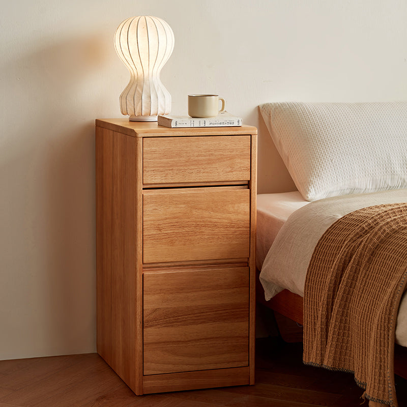 Jerry rubberwood three-drawer bedside table in natural finish – view 2