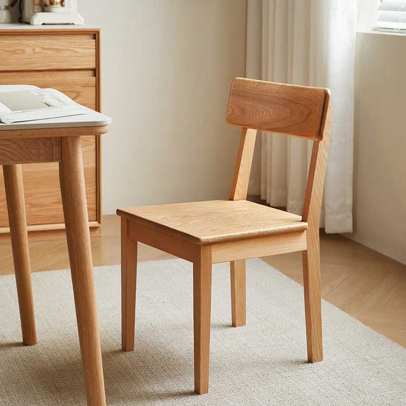 Kya armless solid oak dining chair in walnut colour – view 9