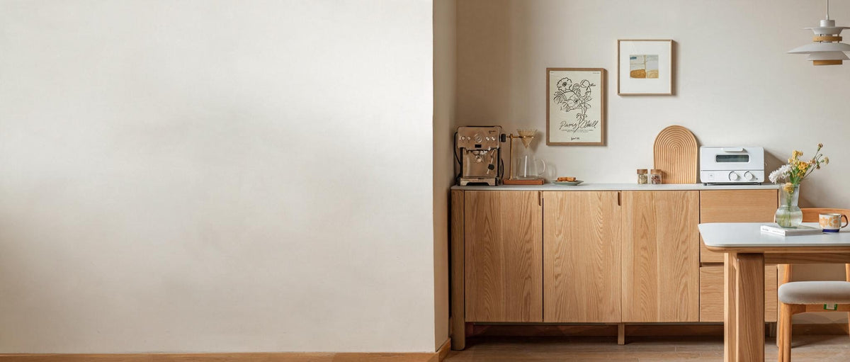 Solid American oak sideboard in a sunlit dining room, with open wall space to the left