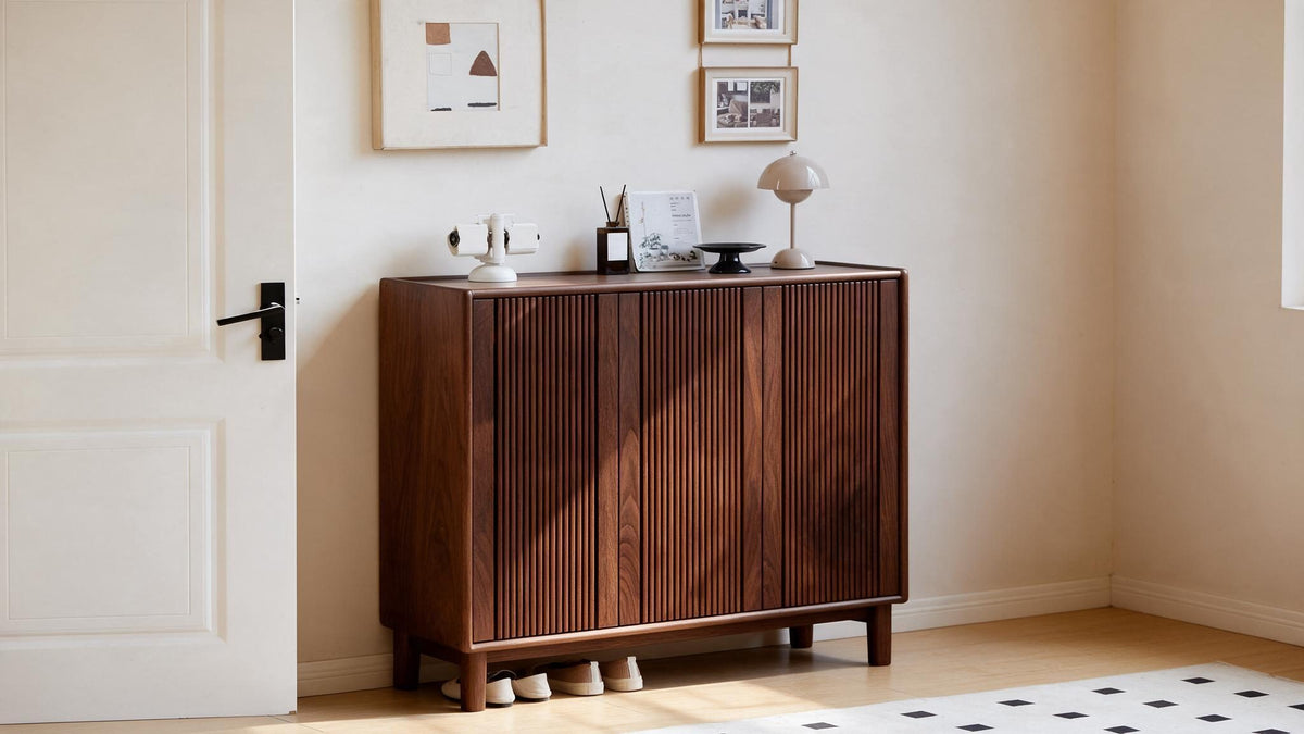 Solid black walnut furniture in a calm room lit by late afternoon sun
